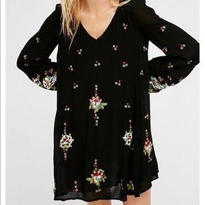 Free People embroidered mini dress. Size L